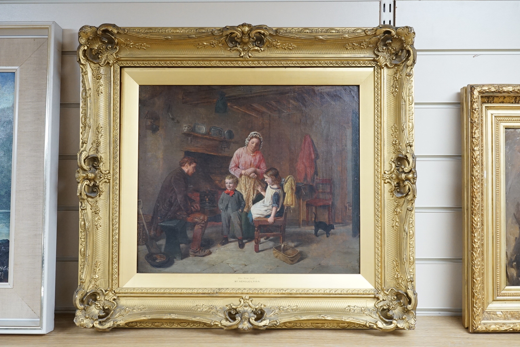 William Hemsley RBA (1819-1906), oil on canvas, 'The New Suit', signed, 35 x 41cm, ornate gilt frame. Condition - good
